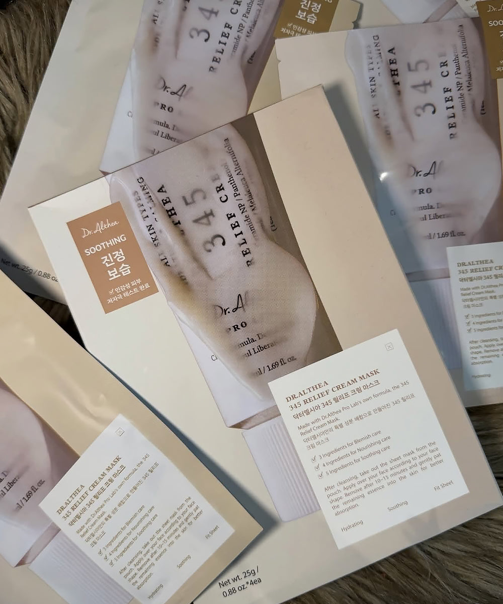 Macro texture shot of the high-adhesion sheet mask material saturated in a rich cream-based formula, highlighting the intensive soothing and hydrating properties