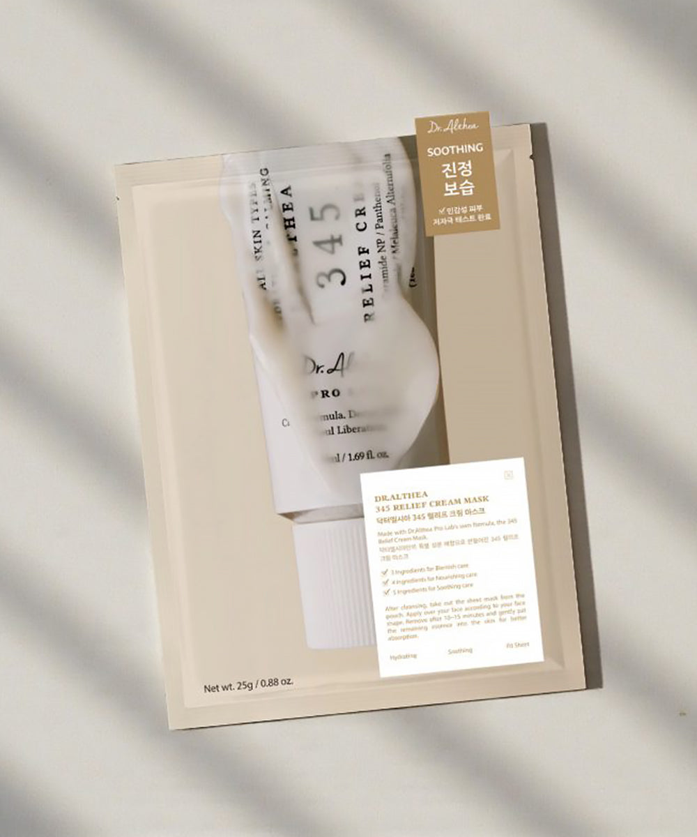 Lifestyle photography of the Dr. Althea 345 Relief Cream Mask packets on a neutral background, emphasizing a professional-grade, calming skincare treatment
