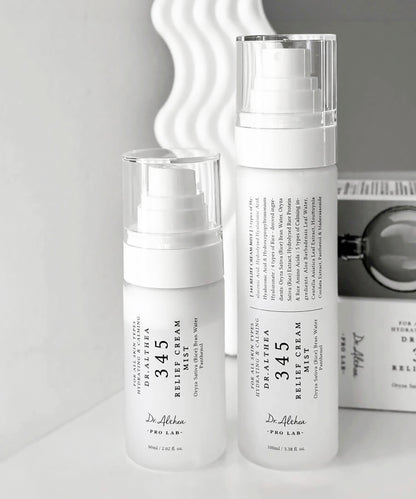 Two skincare products with labels on a light gray background