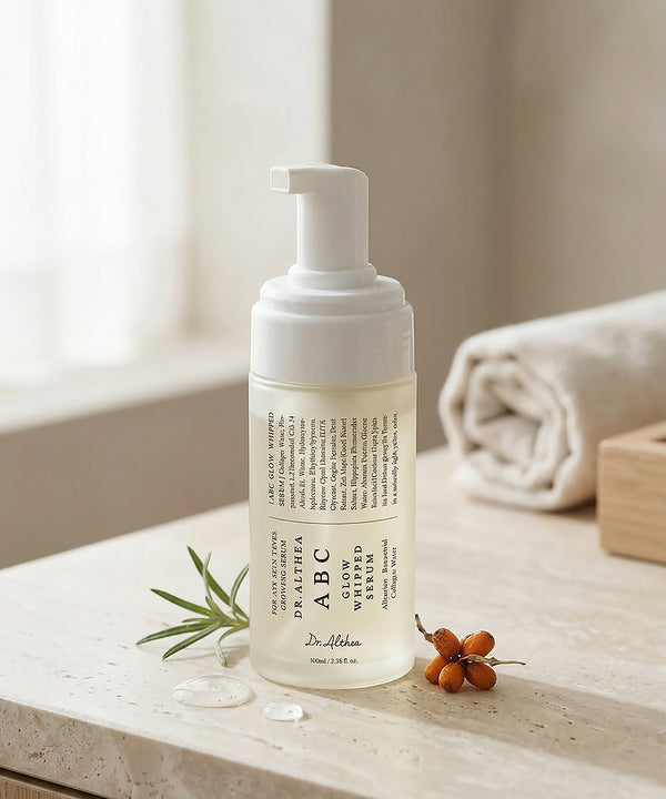 Foam cleanser bottle with text on a neutral background