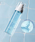 Blue bottle with a spray mechanism on a light blue tiled background