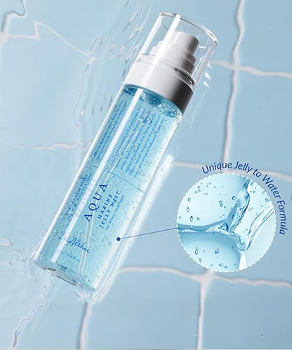 Blue bottle with a spray mechanism on a light blue tiled background