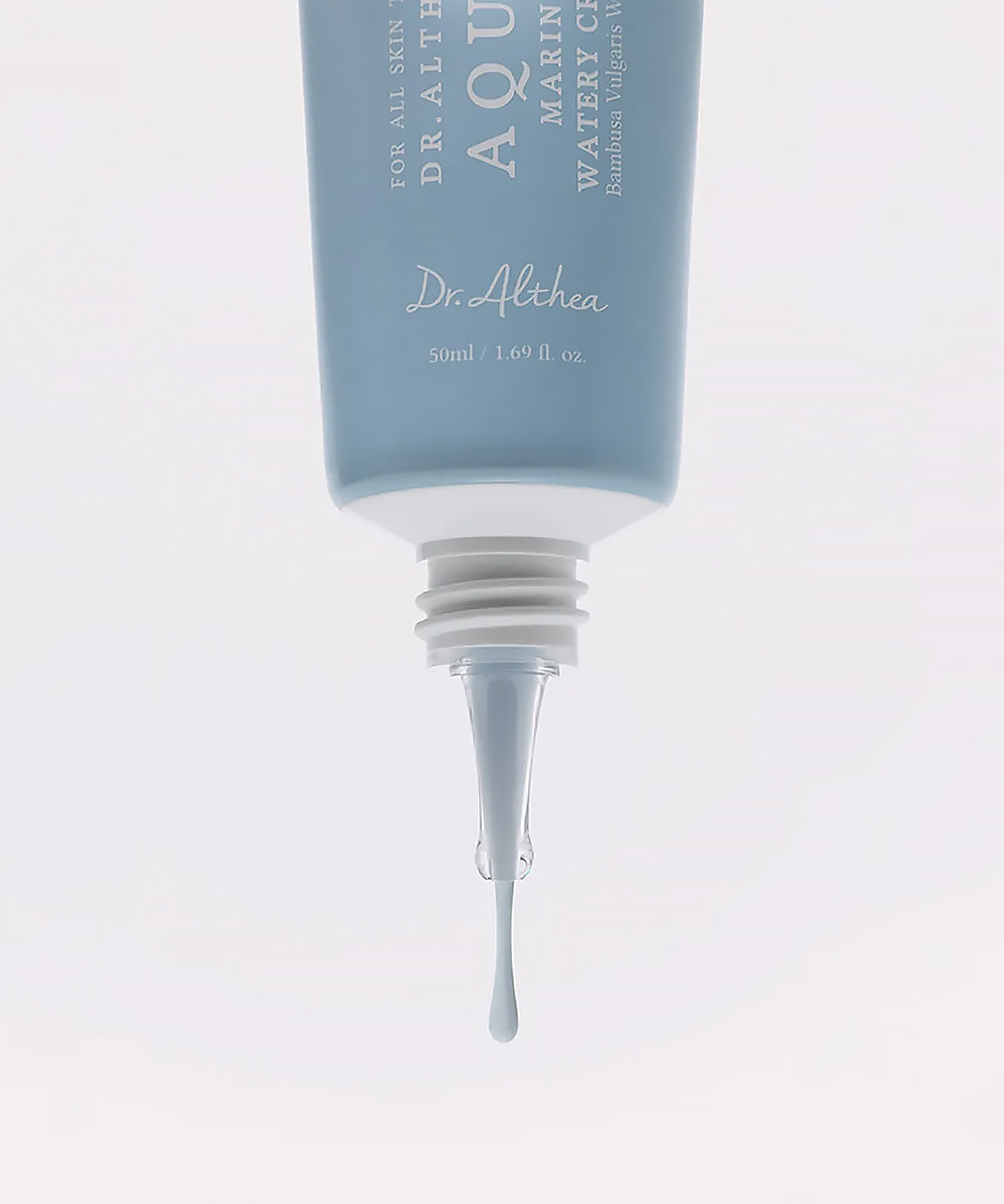 Dr. Althea skincare product with dropper on a light gray background