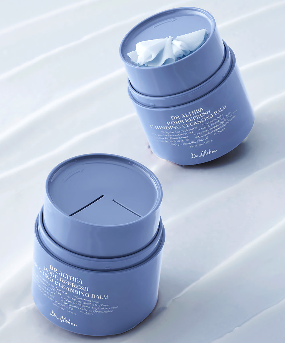 Two blue containers of Dr. Althea Pure Refreshing Cleansing Balm on a light background
