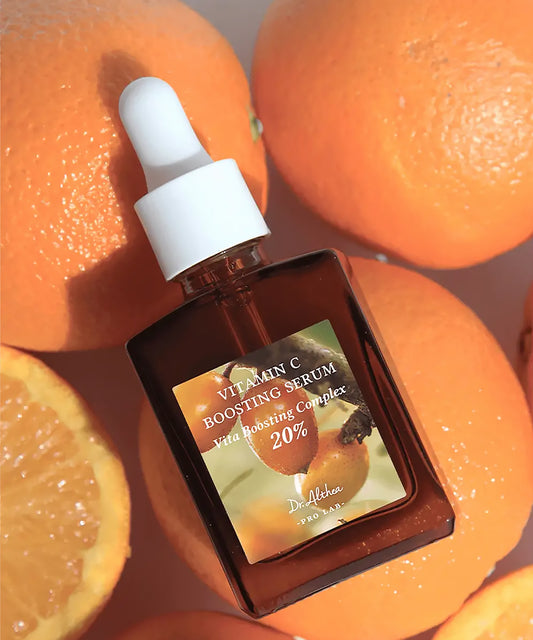 Vitamin C boosting serum with oranges in the background