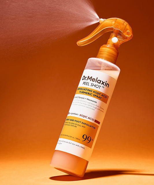 Dr. Melaxin peel shot spray bottle on an orange background