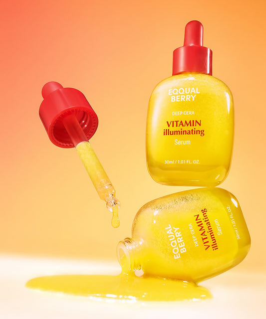 Yellow serum bottle with red cap on a gradient orange background