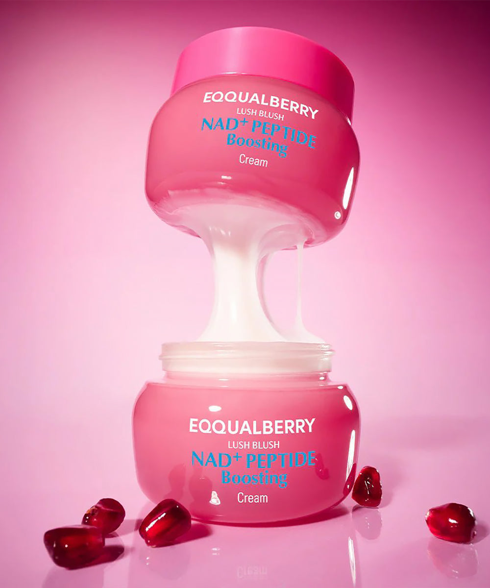 Pink skincare cream jar with 'Eqqualberry' branding on a pink background
