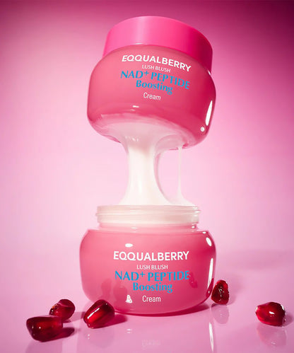 Pink skincare cream jar with 'Eqqualberry' branding on a pink background