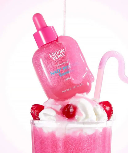 Pink bottle labeled 'Eqqual Berry' with a strawberry milkshake and cherry toppings on a white background