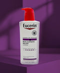 Eucerin Roughness Relief Lotion bottle on a purple background