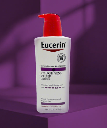 Eucerin Roughness Relief Lotion bottle on a purple background