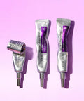 Three silver tubes of Mary & May Spicule Collagen PDRN Cream in various stages of use against a purple background, highlighting the durable and squeezable tube design