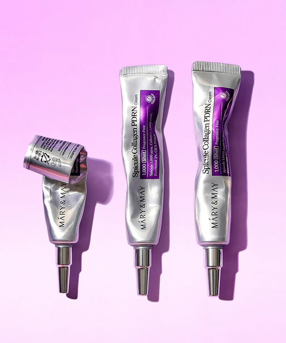 Three silver tubes of Mary & May Spicule Collagen PDRN Cream in various stages of use against a purple background, highlighting the durable and squeezable tube design