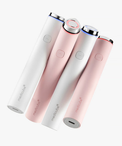 Detailed view of the back of the Medicube Booster Pro Mini, showcasing the streamlined ergonomic grip and the charging port of the high-tech beauty device