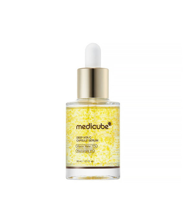 Front-facing product shot of the Medicube Deep Vita C Capsule Serum 30ml glass bottle with a gold dropper, against a clean white background