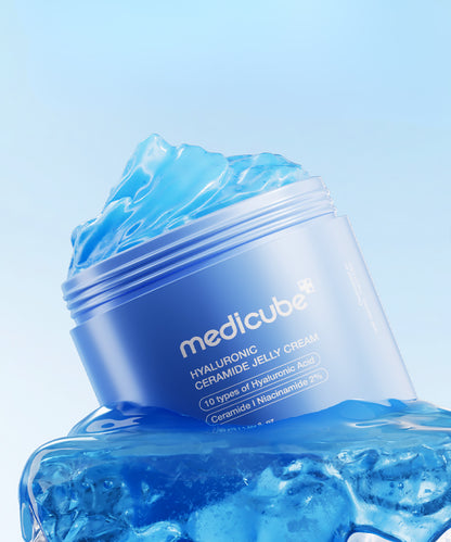 Close-up of the opened jar of Medicube Jelly Cream, showcasing the translucent, bouncy blue gel texture designed for deep hydration