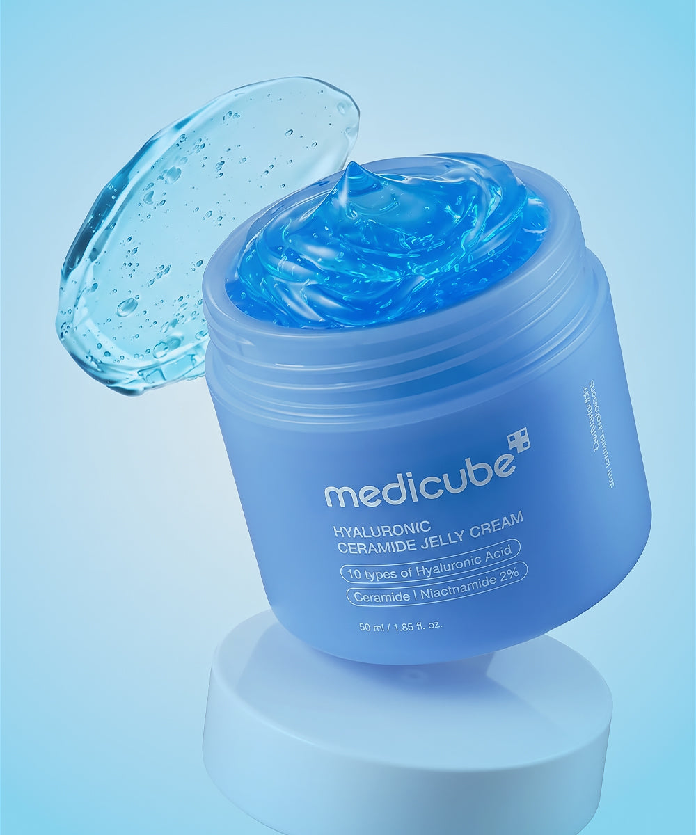 Lifestyle photography of the Medicube Jelly Cream jar with soft water reflections, symbolizing the intense 24-hour hydration and skin-plumping benefits