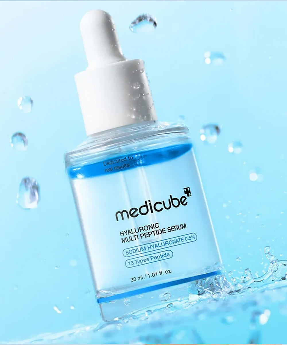 Medicube Hyaluronic Multi Peptide Serum bottle on white background with peptide capsules