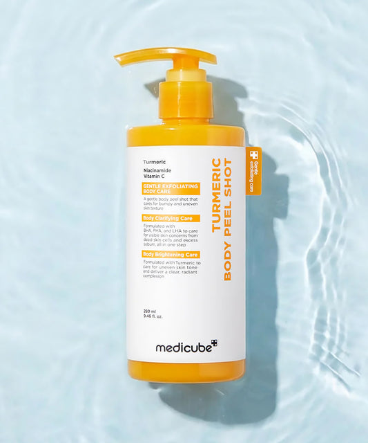 Close-up of the Medicube Body Peel Shot label, emphasizing key ingredients like Kojic Acid and Turmeric designed to target body hyperpigmentation and dark spots