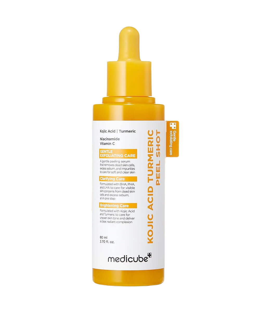 Front-facing product shot of the Medicube Kojic Acid Turmeric Peel Shot (30ml) glass bottle with its minimalist white and yellow packaging box