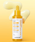 A detail shot of the Medicube Peel Shot bottle on a clean white surface, showcasing the clinical labeling and specialized blemish-care ingredients