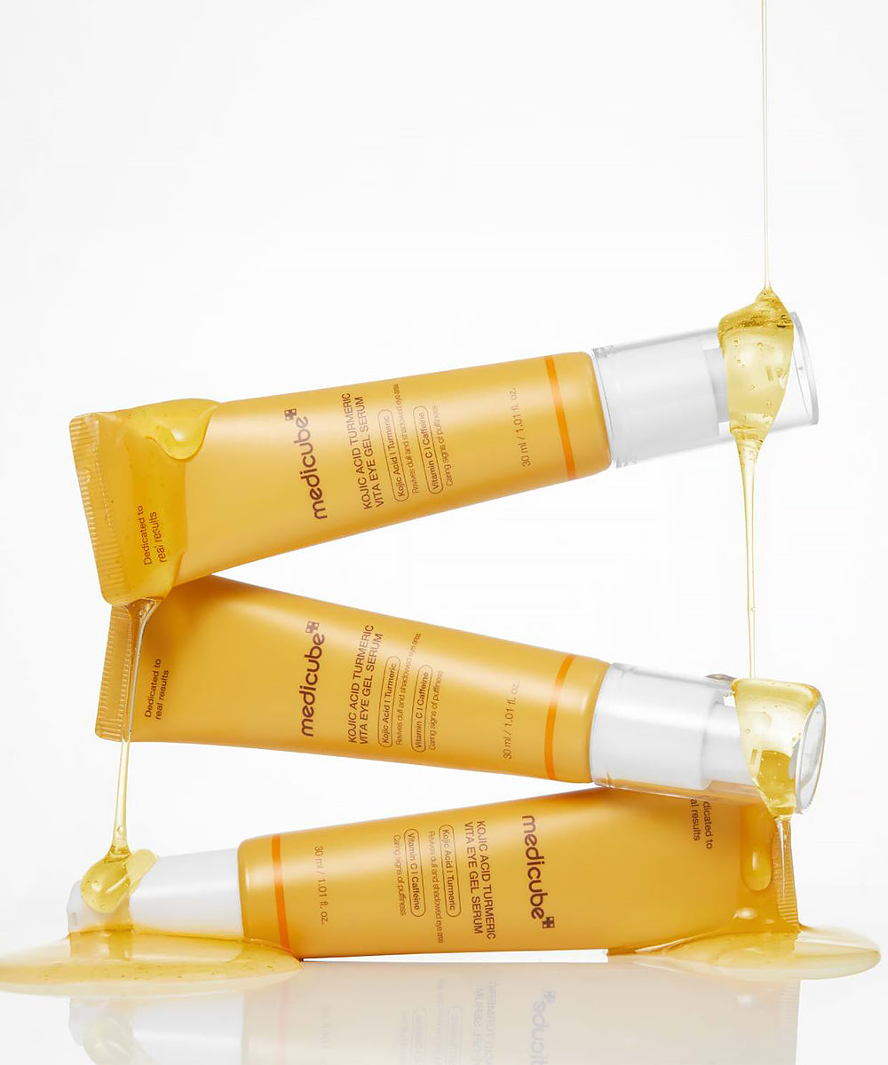 A detailed view of the Medicube Vita Eye Gel Serum bottle, showcasing the clinical branding and specialized formula for targeting dark circles and under-eye pigmentation
