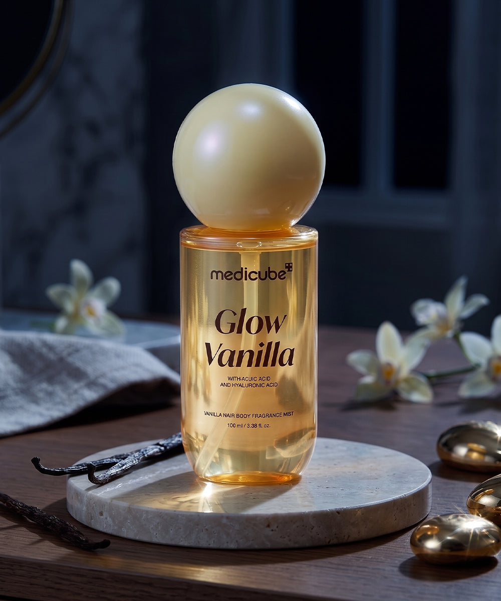 Medicube Vanilla Hair & Body Fragrance Mist 100ml on a stone slab, lightweight fast-drying scent mist
