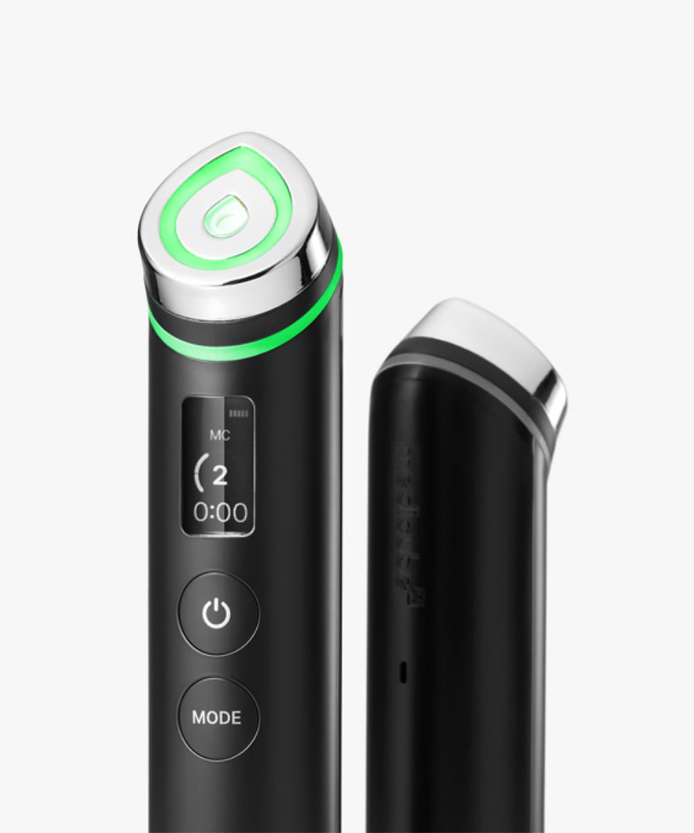 Black electronic device with green accents on a white background
