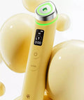 Close-up of the Medicube Age-R Booster Pro treatment head glowing with vibrant pink LED light, illustrating the device's skin-boosting technology for enhanced product absorption