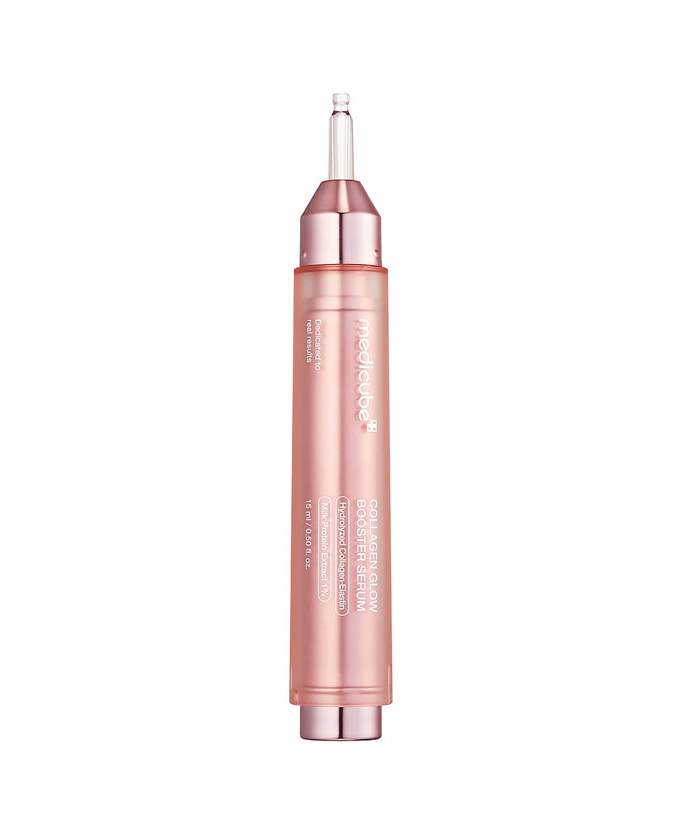 Rose gold cosmetic pen on a white background