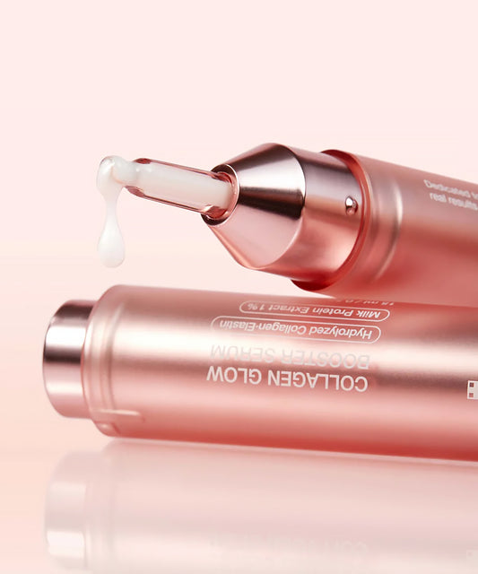 Rose gold skincare device with a clear applicator on a white background