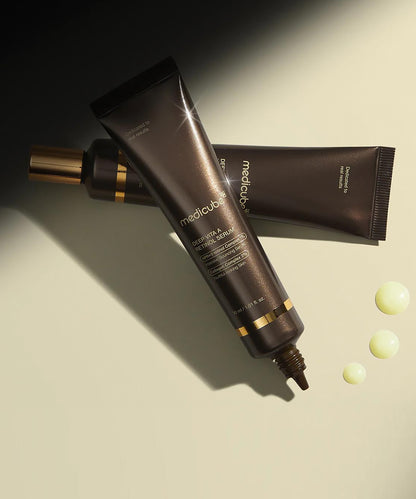 Cosmetic tube and packaging with 'medicube' branding on a beige background