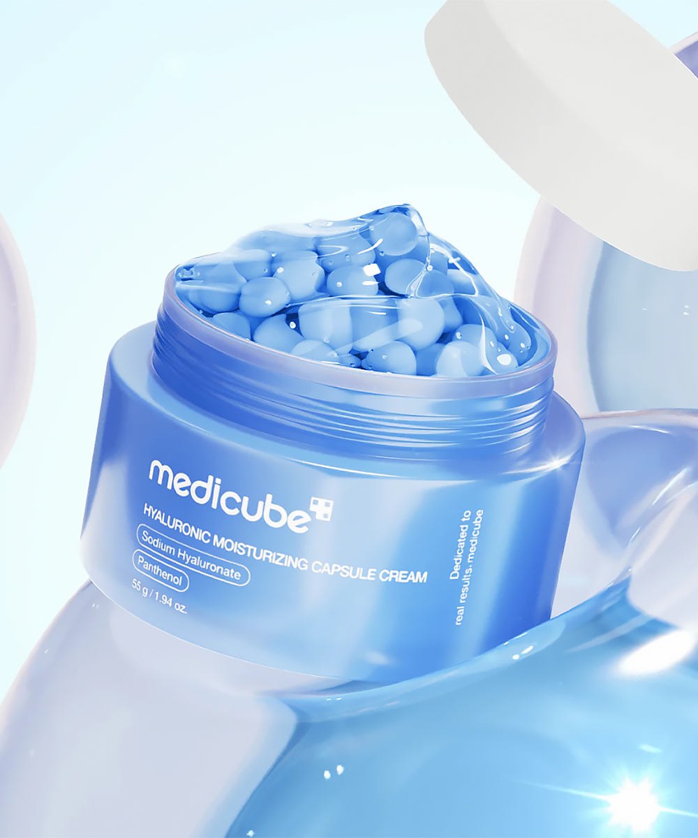 Medicube hyaluronic moisturizing capsule cream with blue capsules on a light blue background