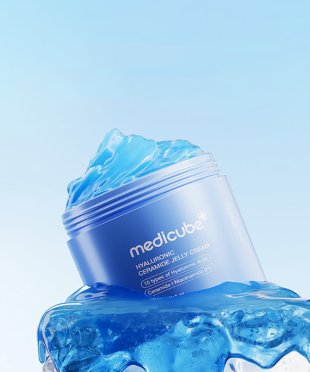 Blue jar of Medicube cream with blue jelly-like substance on a light blue background