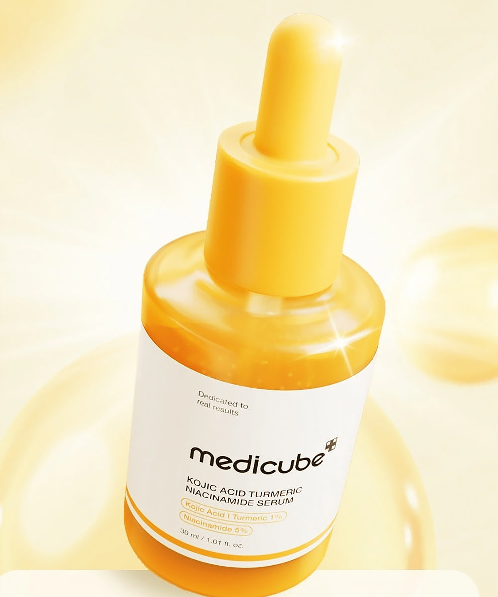Medicube skincare serum bottle on a light yellow background