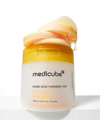 Medicube Kojic Acid Turmeric Pad container with yellow lid on a white background