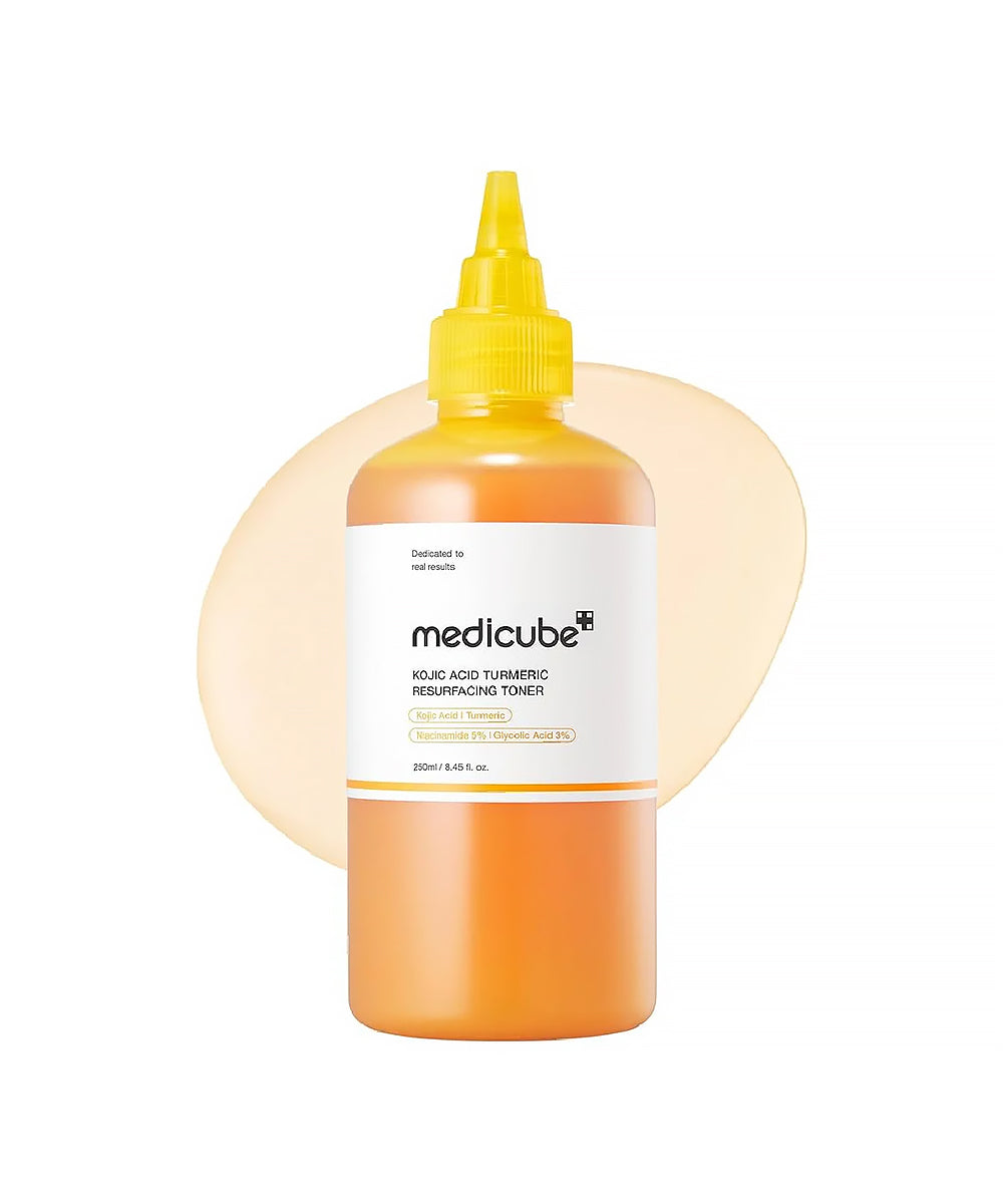 Bottle of Medicube toner with a yellow cap on a white background