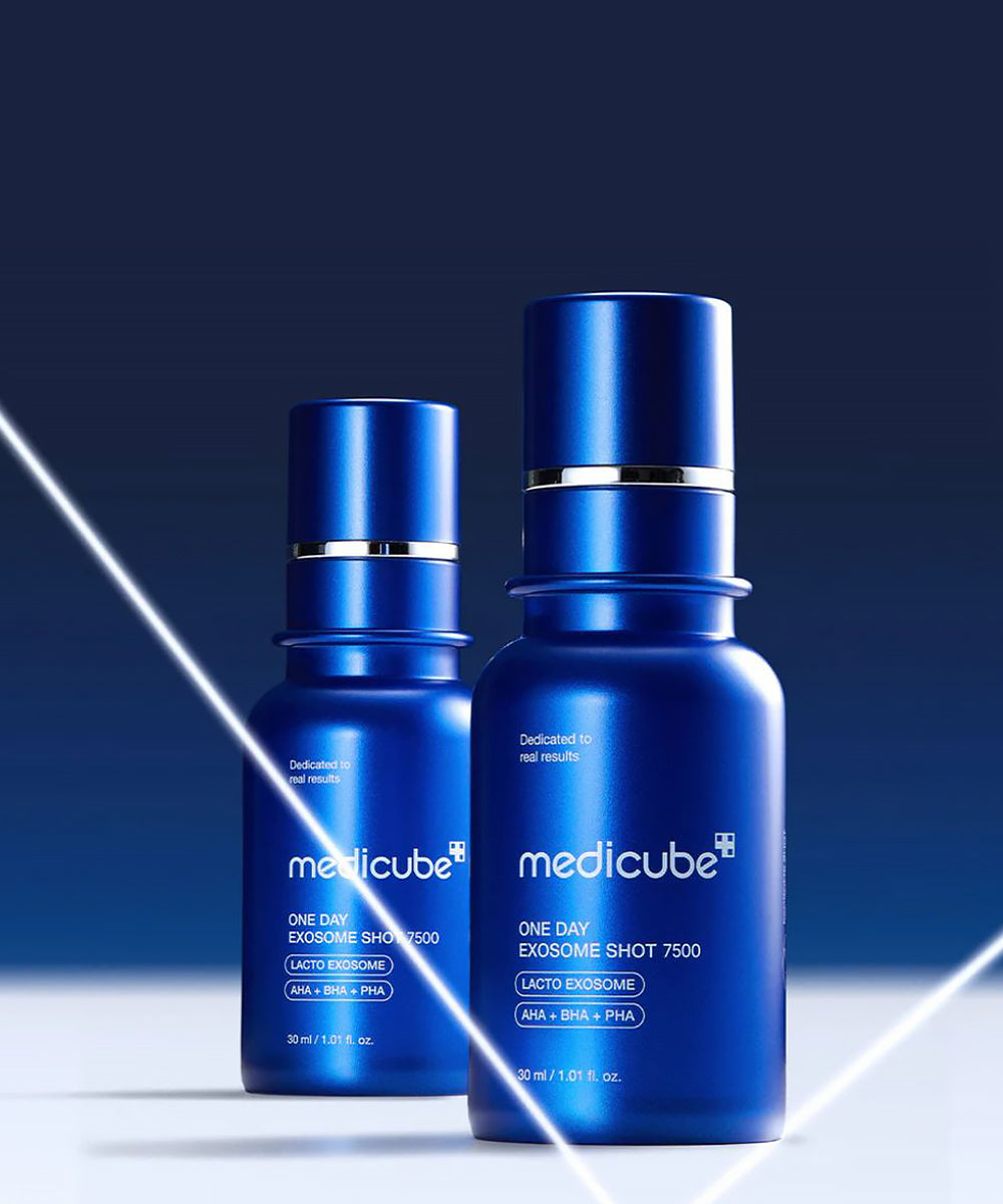 Two blue Medicube skincare bottles on a gradient blue background