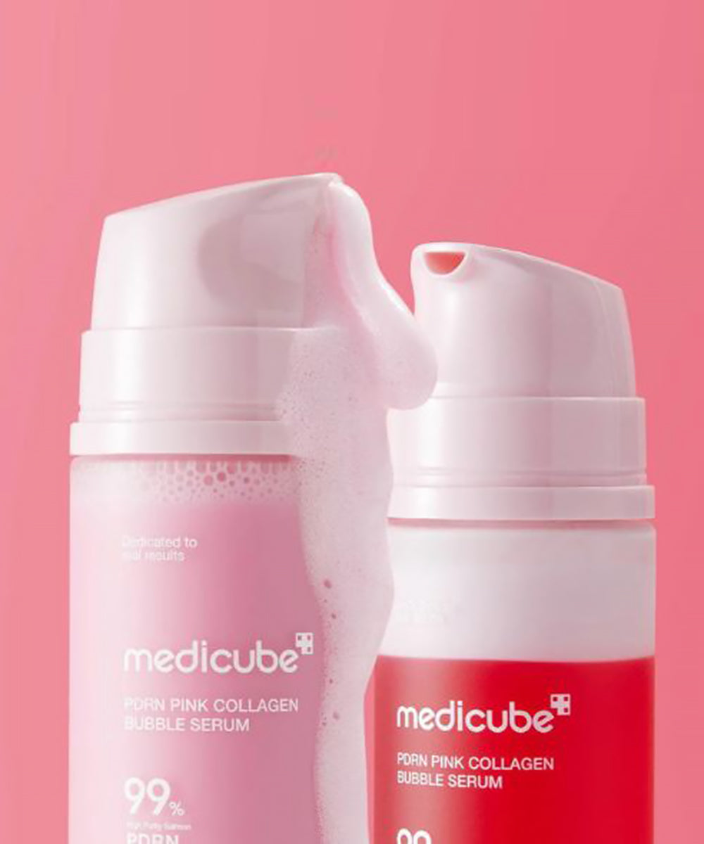 Two bottles of Medicube Pink Collagen Bubble Serum on a pink background