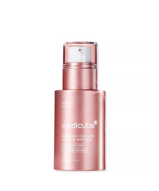 Front view of the Medicube PDRN Pink Collagen Exosome Shot 2000 in a sleek, metallic pink 30ml bottle with a white pump dispenser and clear cap