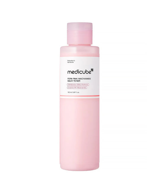 Pink bottle with white label on a white background