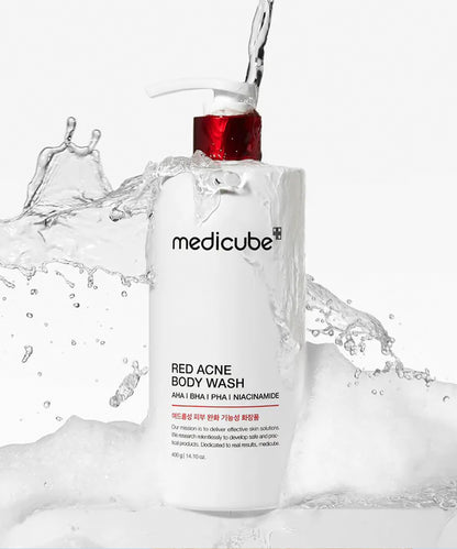 Medicube Red Acne Body Wash with water splashes on a white background