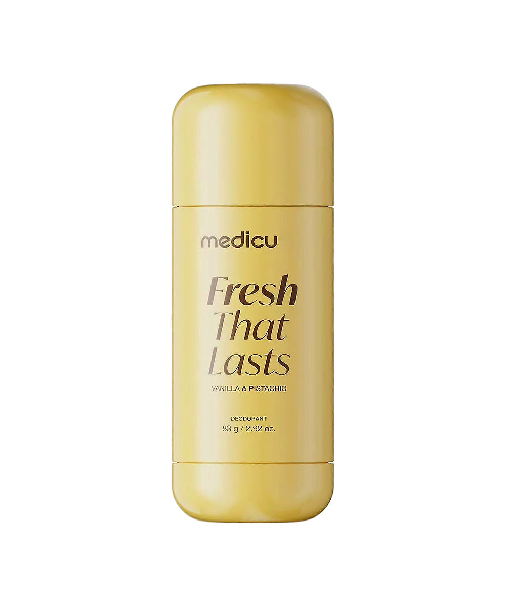 A gold deodorant stick by medicu, labeled 'Fresh That Lasts' in brown lettering, set against a plain white background.