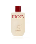 Moev shampoo bottle with red cap on a white background