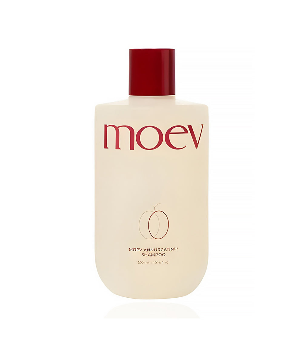 Moev shampoo bottle with red cap on a white background