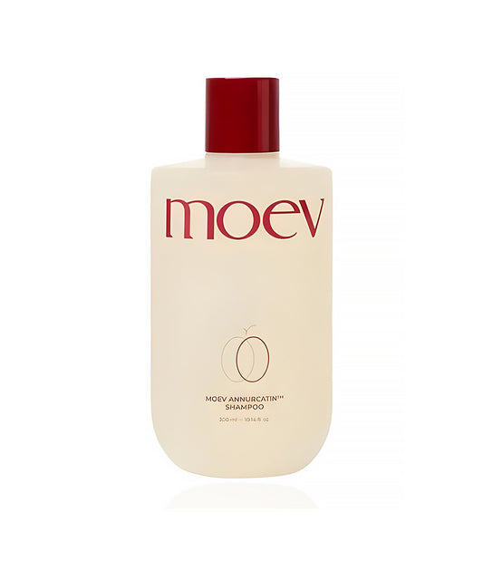 Moev shampoo bottle with red cap on a white background
