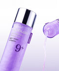 Purple Numbuzin skincare bottle with silver cap on a light purple background