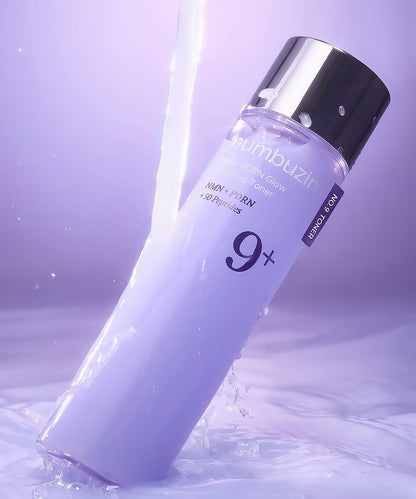 Skincare bottle with a purple gradient and silver cap on a matching purple background