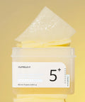 Numbuzin pads with a container and pads on a yellow background